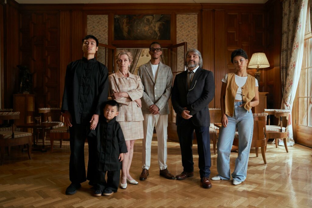 multiracial family posing together in luxury room