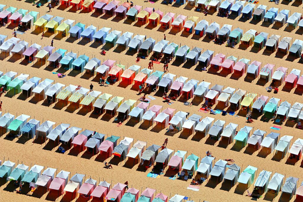 colorful beach tents at nazare portugal